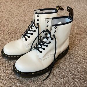 Doc Marten’s White boots.